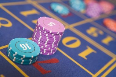 Mobile devices displaying live dealer and esports markets